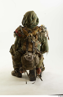 Photos John Hopkins Army Postapocalyptic Suit Poses kneeling whole body…